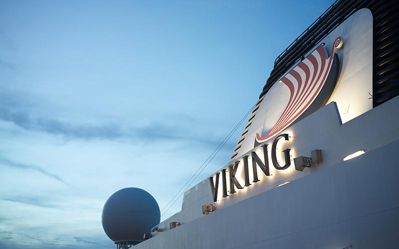 Travel agent helping a couple plan their trip